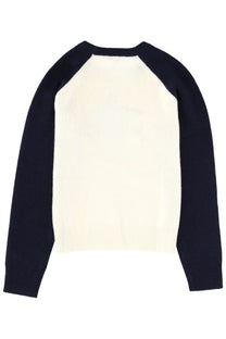 Cream-colored sporty and rich unisex jersey sweater with navy blue raglan sleeves and ribbed cuffs