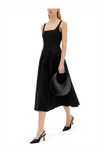 Black leather crescent-shaped handbag from Staud womens Abito Ellison black featuring a sleek curved design