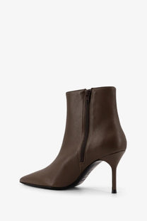 Brown leather ankle boot with pointed toe and slim high heel from Staud womens Sebastian leather boots Brown collection