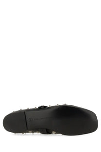 Stella McCartney women’s dancer Ryder black platform shoe with black studded minimalist design and metallic hardware accents