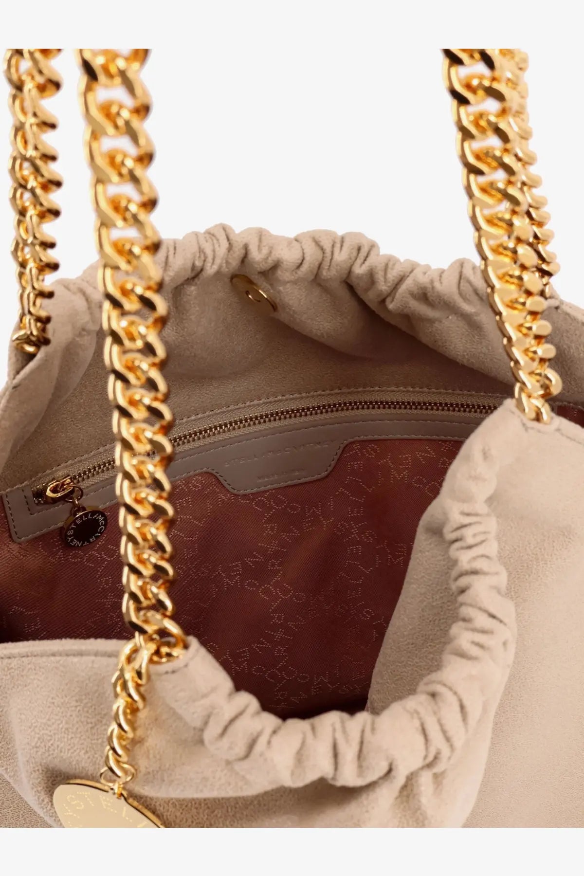 Stella McCartney women’s falabella shoulder bag in beige suede with gold-tone chain straps and branded interior lining