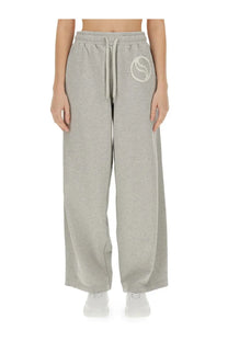 Stella McCartney women’s grey heathered jogging pants with white embroidered logo and matching drawstring waistband