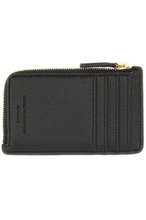 Black leather card case with gold-tone zippered pull and embossed stella mccartney logo in ryder wallet style