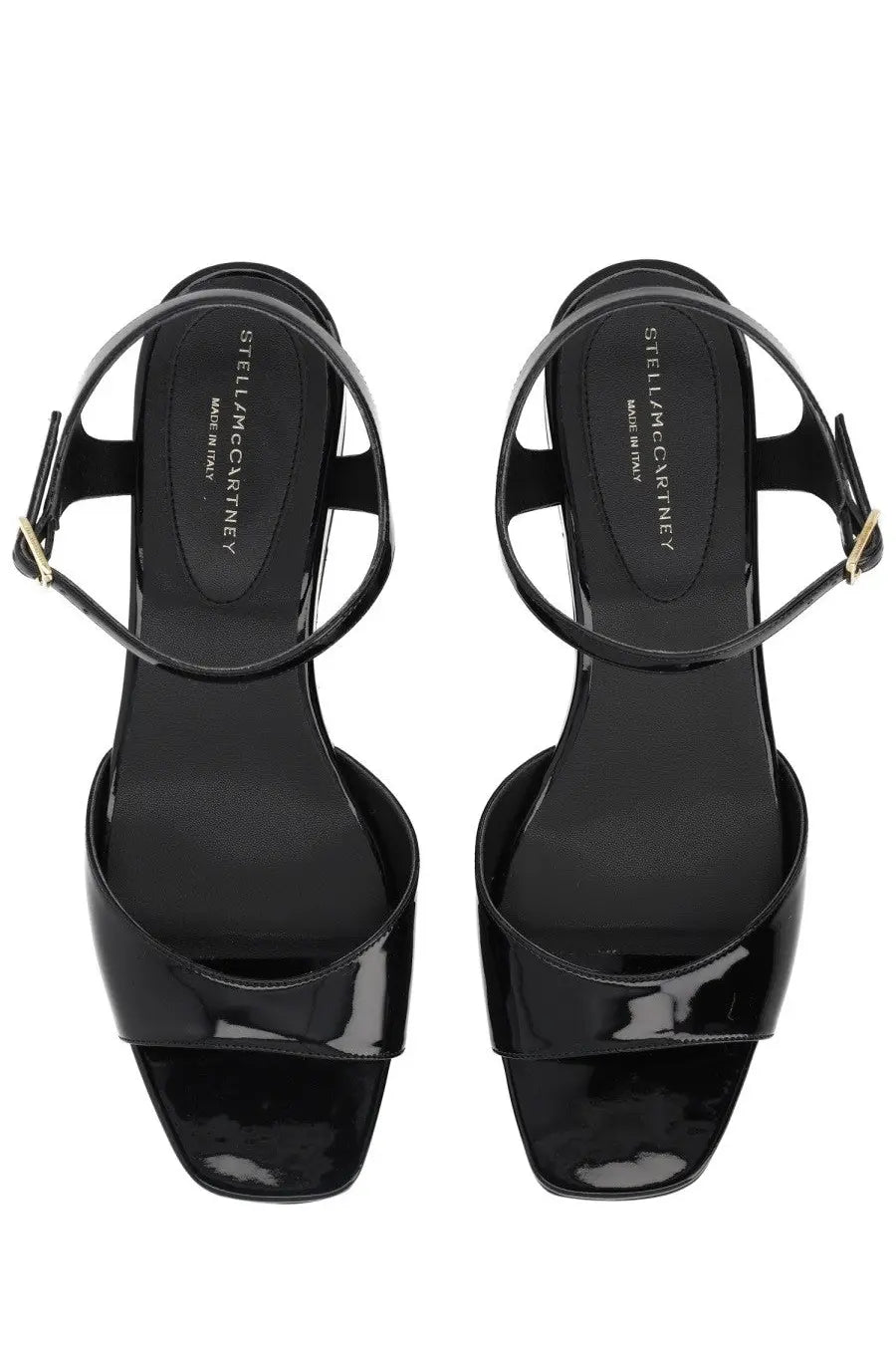 Stella McCartney women’s Elyse black sandal wedges in patent leather with minimalist design and gold-tone buckle accents