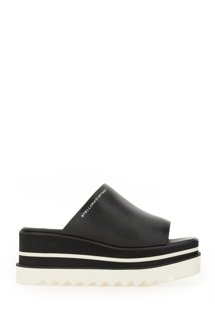 Stella McCartney women’s black leather slide sandal with thick platform sole white stripes and textured edge