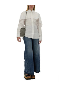 Stella McCartney women’s white shirt featuring a layered blouse design with sheer ruffled sleeves and button-down front