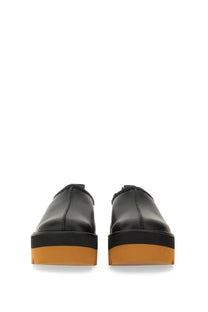 Stella McCartney women’s sneak Elyse slip-on black leather platform shoes with bold orange rubber sole