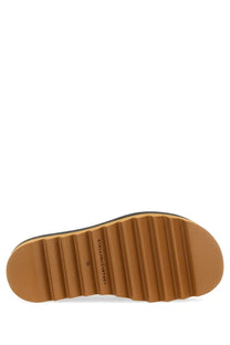 Tan rubber sole with ribbed texture and black edge featuring givenchy logo on stella mccartney women’s sneak elyse slipper black