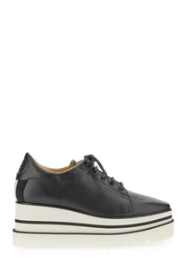 Stella McCartney women’s stringata con zeppa Elyse black leather platform sneaker with white sole and black laces