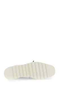 White rubber sole with textured ribbed pattern and subtle branding on the side of stella mccartney womens stringata con zeppa elyse black