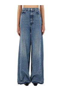 Stella McCartney women’s wide leg jeans in medium blue wash denim with high waist and frayed hems