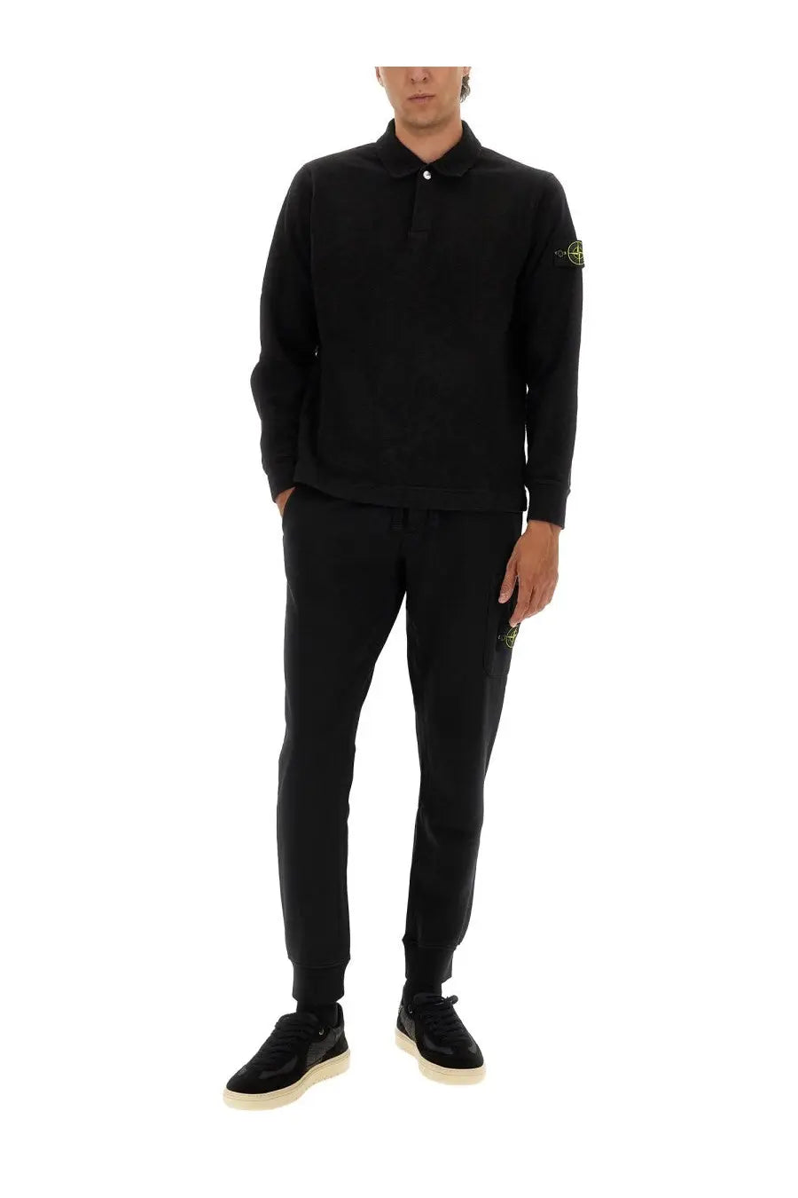 Stone Island men’s black cotton vanisé long-sleeved polo shirt with a subtle neon green logo on the left sleeve