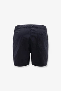 Back view of stone island men’s econylon swim trunks in black with elastic waistband and buttoned back pocket