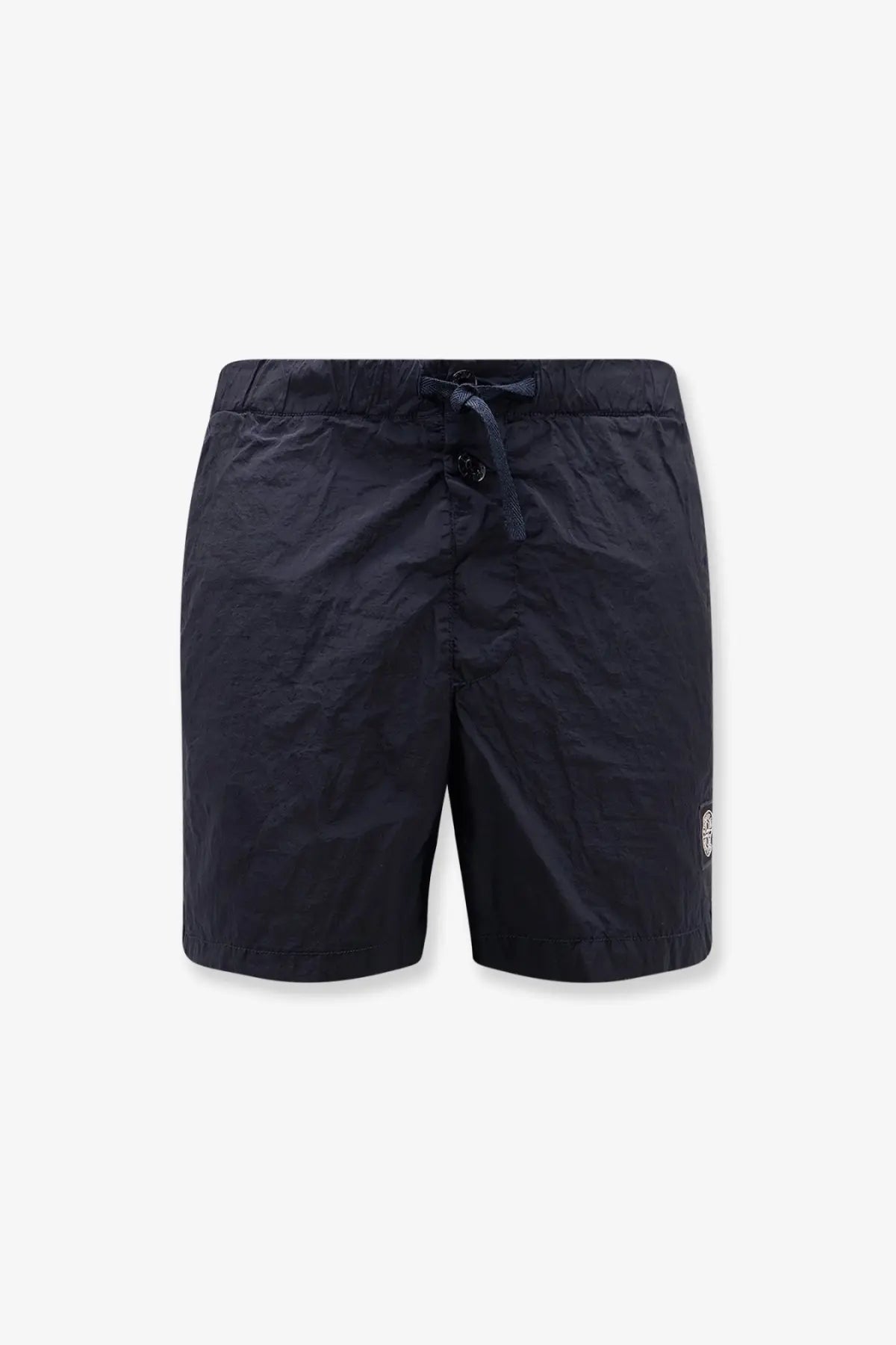 Stone Island men’s econylon swim trunks in dark navy blue with elastic waistband and white logo on lower right leg