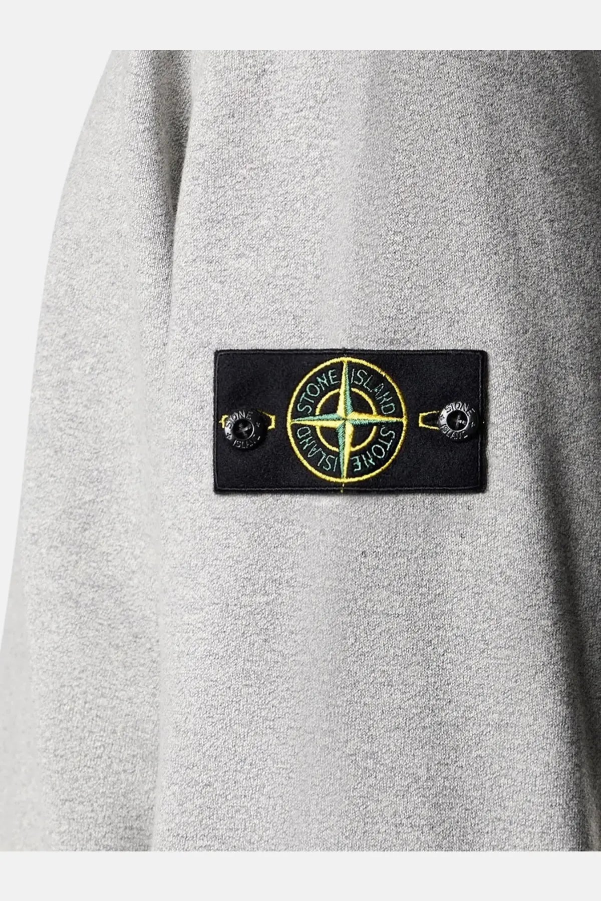 Stone Island men’s élange cotton sweatshirt grey with gray textured fabric and black patch featuring yellow green compass logo