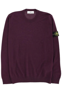 Stone Island men’s jersey crewneck sweater in maroon with black sleeve patch featuring compass rose logo
