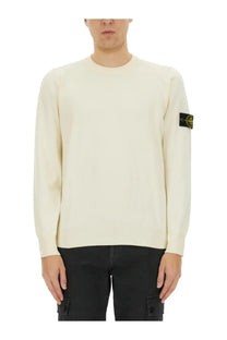 Stone Island men’s cream-colored long-sleeved knit sweater with black patch logo on left sleeve