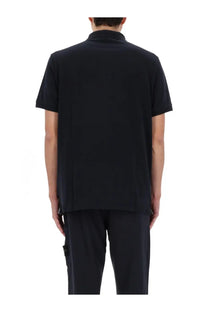 Stone Island men’s polo shirt in black with short sleeves collar and subtle seam detailing for casual wear