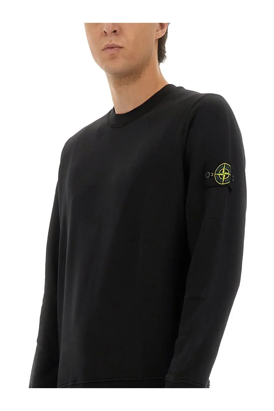 Stone island men’s regular fit black sweatshirt featuring a neon yellow logo patch on the left sleeve