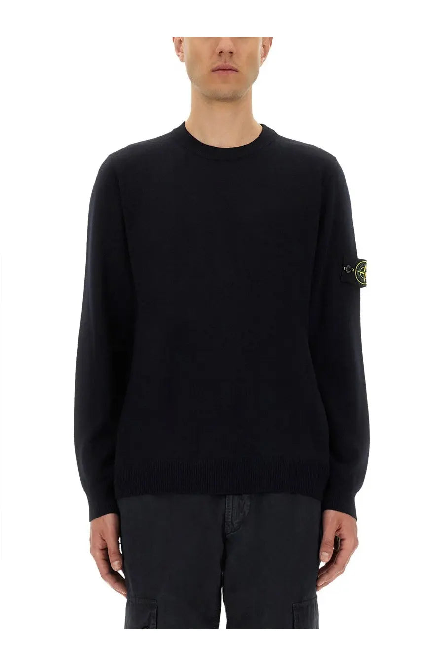 Stone Island men’s black knit sweater with lightweight wool and subtle yellow logo patch on left sleeve