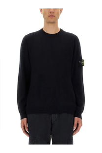 Stone Island men’s black knit sweater with lightweight wool and subtle yellow logo patch on left sleeve