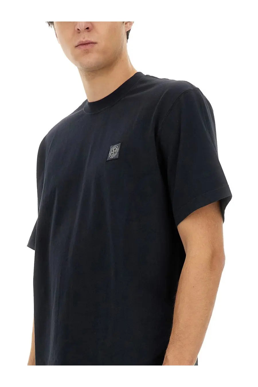 Stone Island men’s black short-sleeved t-shirt with dark square logo patch on left chest for casual wear