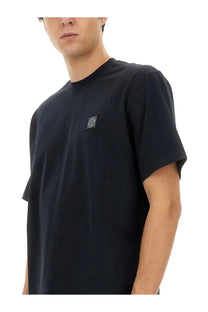 Stone Island men’s black short-sleeved t-shirt with dark square logo patch on left chest for casual wear