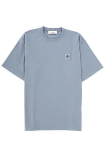 Stone Island men’s light blue short-sleeved shirt with subtle textured fabric and small embroidered logo patch on chest