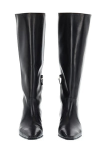 Stuart Weitzman women’s boot Stassi black knee-high leather boots with a sleek glossy finish and pointed toes