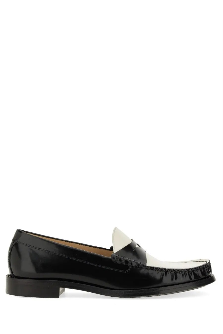 Stuart Weitzman women’s moccasin Lottie multicolor black patent leather loafer with white toe cap and stitched detailing