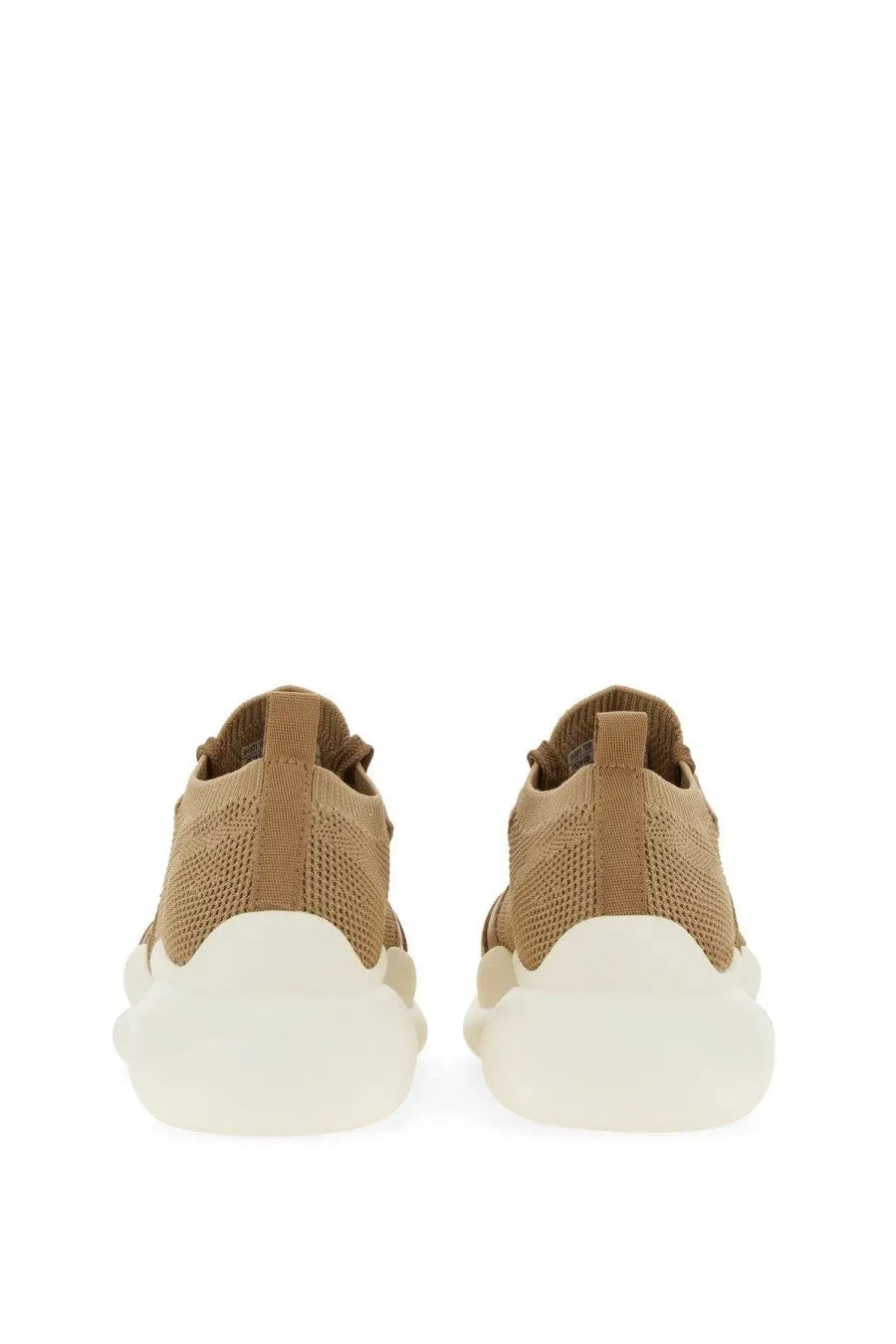 Stuart Weitzman women’s sneaker beige knit upper with chunky white rubber sole for casual wear