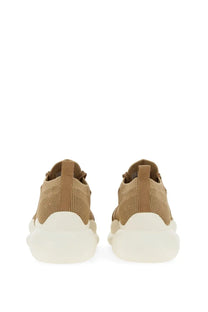 Stuart Weitzman women’s sneaker beige knit upper with chunky white rubber sole for casual wear