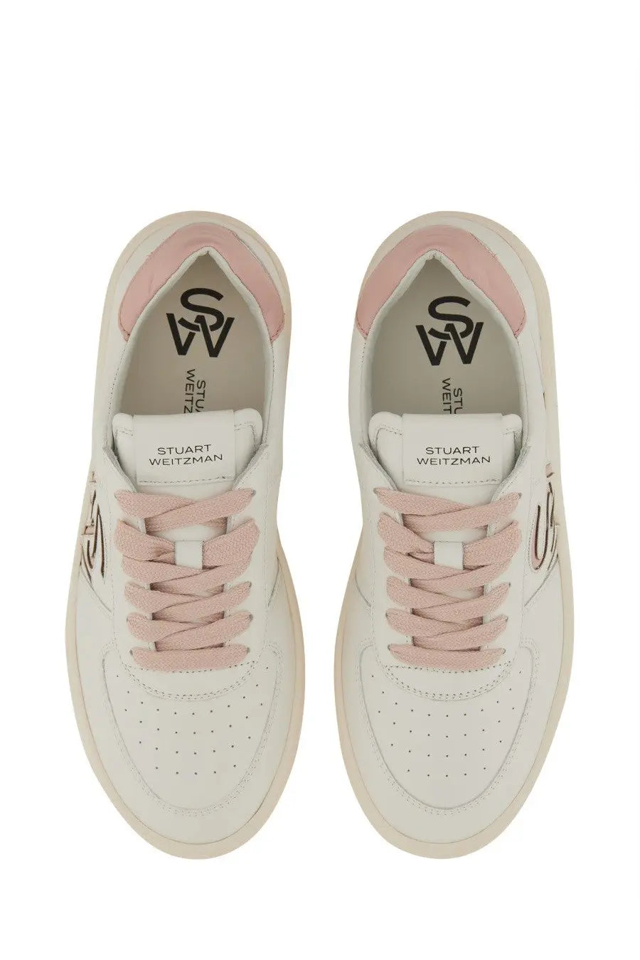 Stuart Weitzman women’s white leather sneakers with pink laces and accents featuring the logo on the insole