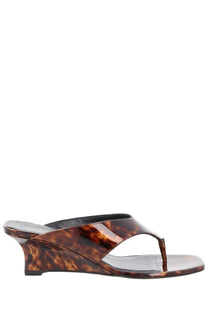 Stuart Weitzman women’s Zeppa Winnie tortoiseshell patent leather wedge sandal with sleek modern design and black insole