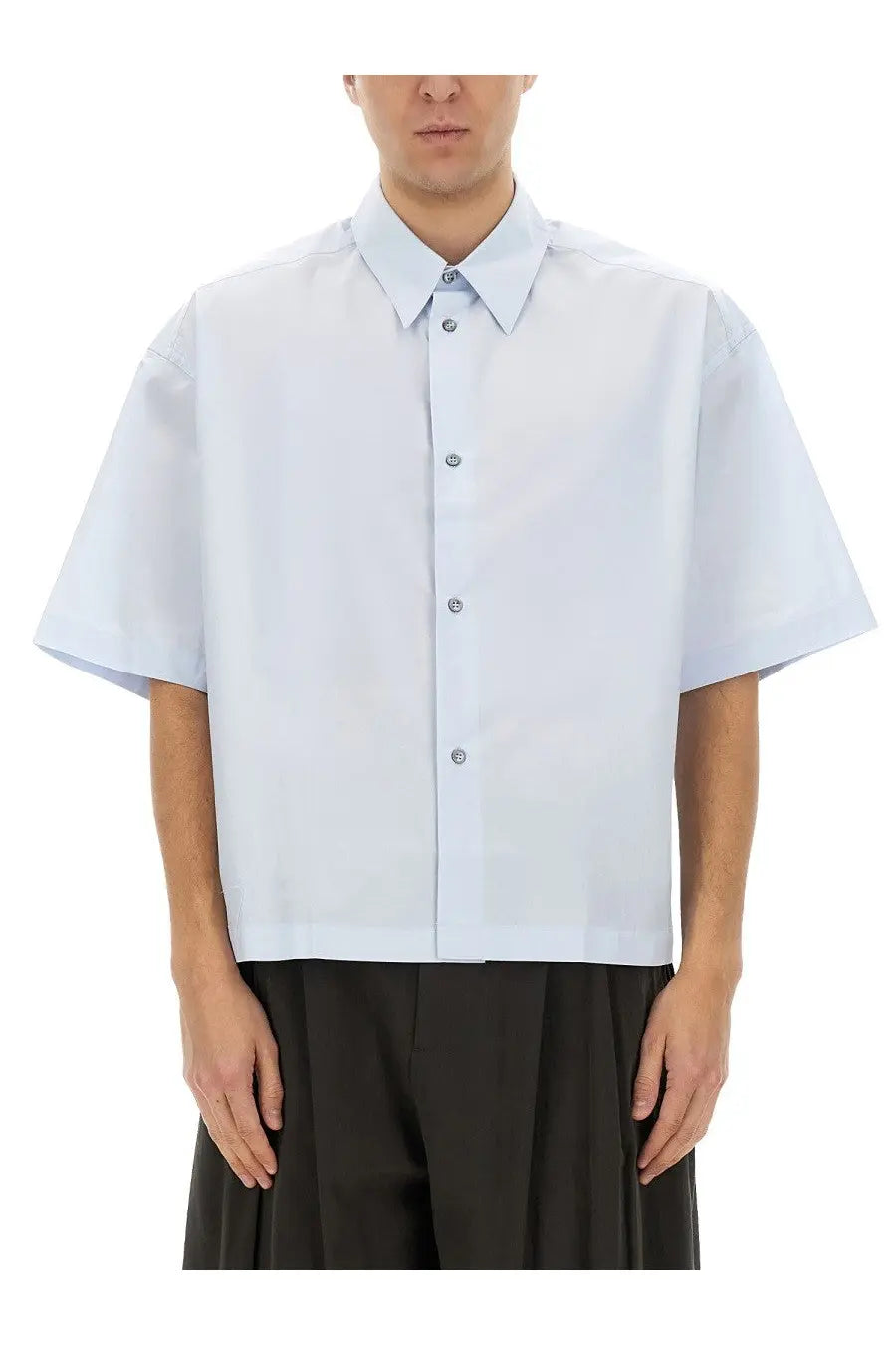 Studio Nicholson men’s short sleeved boxy shirt in crisp light blue with classic collar and subtle stitching details