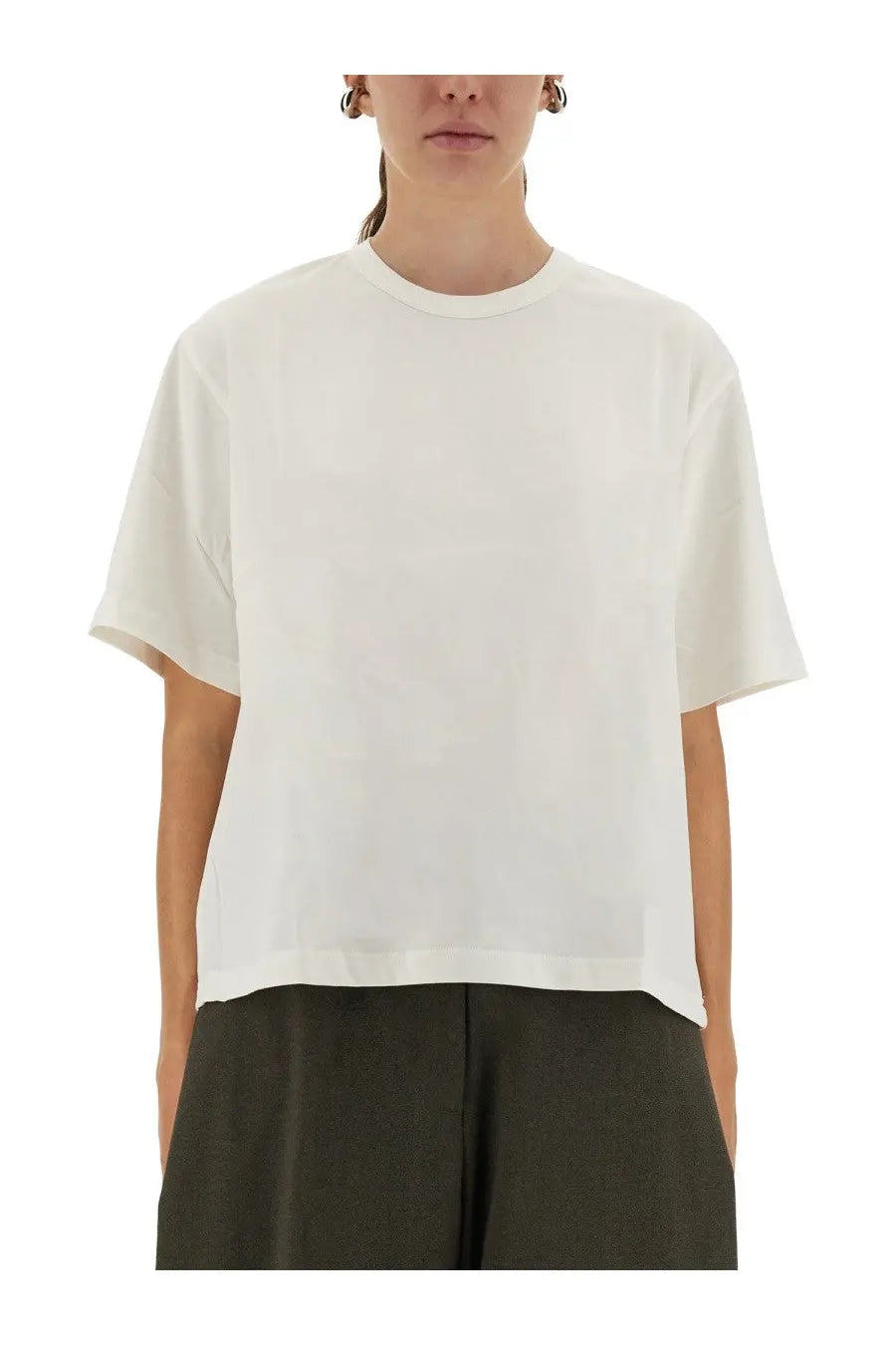 Studio Nicholson women’s white cotton shirt featuring a minimalist relaxed fit with subtle dropped shoulders