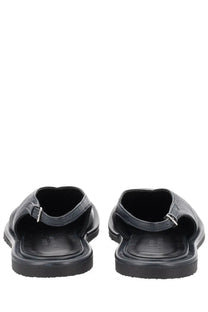 Studio Nicholson women’s sandalo slingback black leather slide sandals with textured finish and silver-toned buckle details