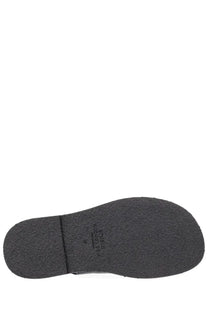 Studio nicholson women’s sandalo slingback black featuring a black rubber sole with textured tread and embossed logo
