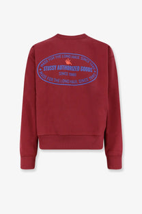 Red stussy men’s authorized crew cotton blend sweatshirt in red showing the back with blue and orange embroidered logo