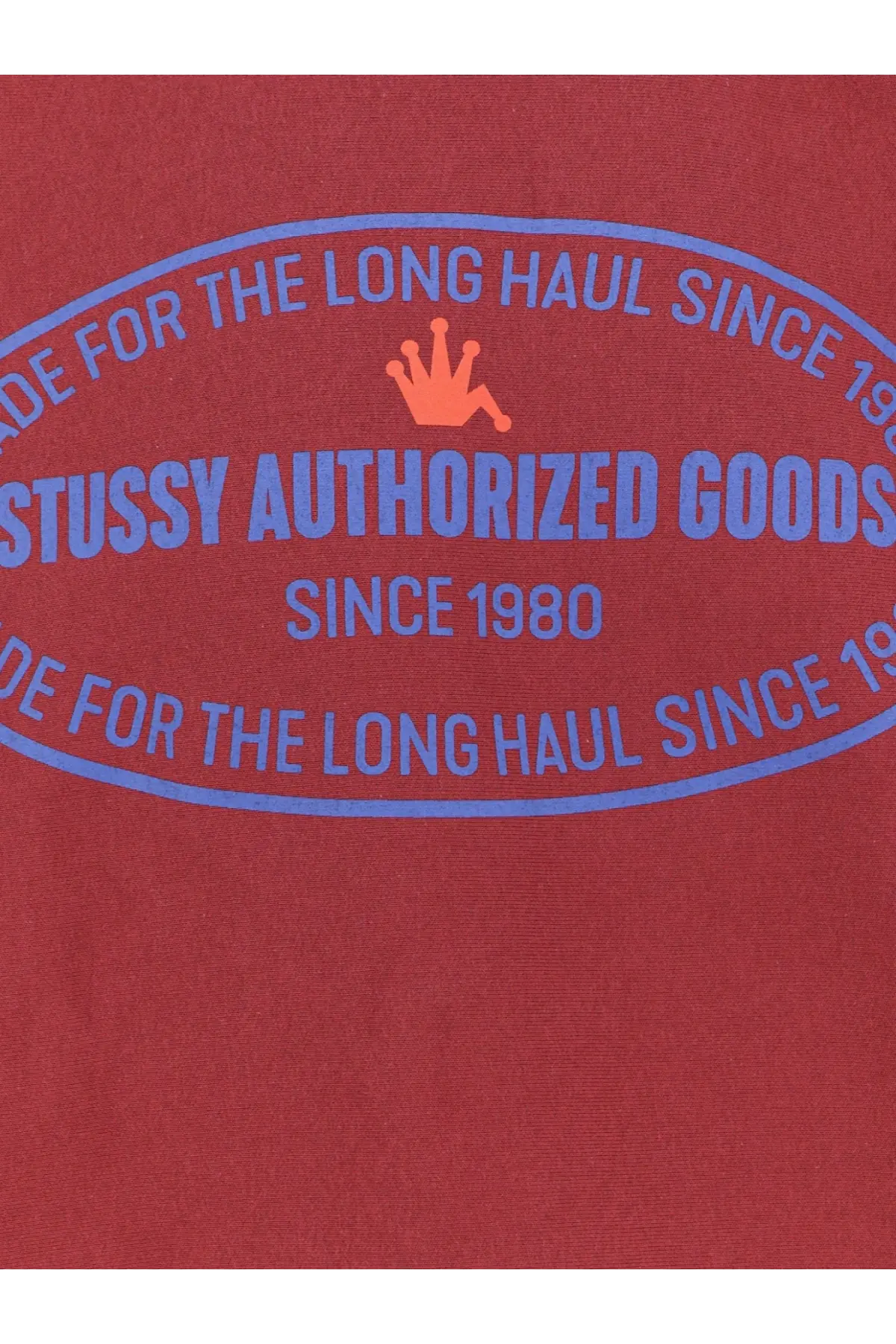 Stussy men’s authorized crew cotton blend sweatshirt red with blue oval graphic and orange crown logo on front