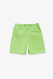 Bright lime green nylon stussy men’s swim trunks with elastic waistband and single back pocket shown from back side