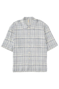 A short-sleeved button-up shirt in light gray and white plaid with subtle texture from sunflower camicia adam blue collection