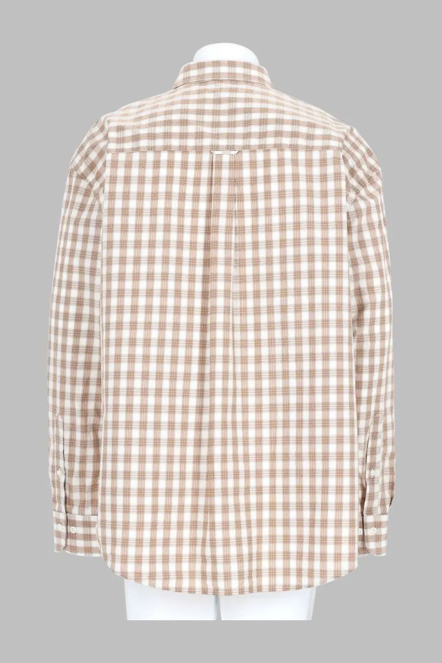 A beige and white plaid long-sleeved button-up shirt with a classic collar.