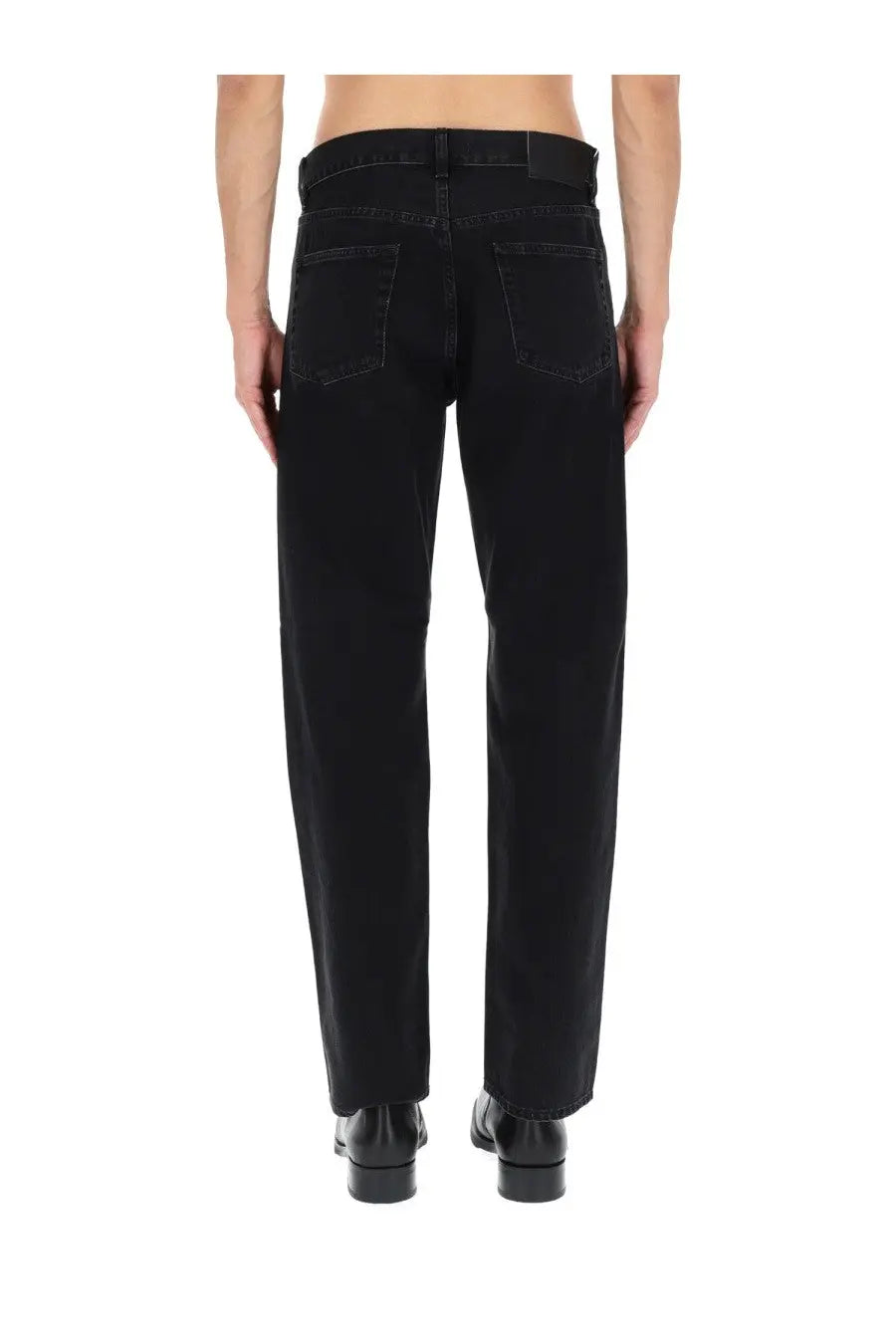 Black denim sunflower men’s wide twist jeans with straight-leg cut and classic back pockets shown from the back