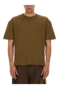Olive green short-sleeved crew neck men’s t-shirt with small embroidered logo on left chest by ten c awake ny