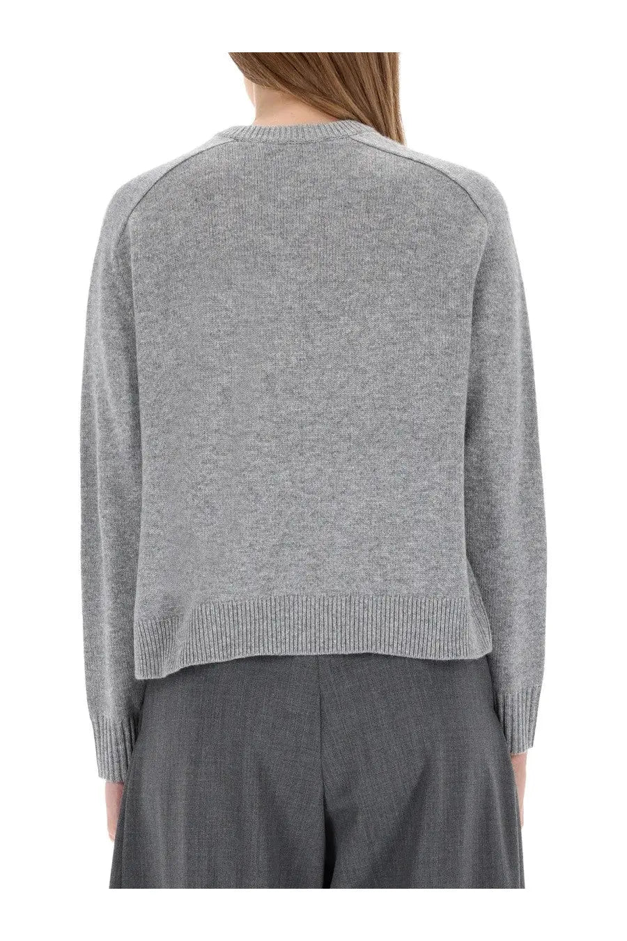 Theory women’s cashmere sweater grey is a soft heather gray knit with ribbed cuffs and hem for cozy wear
