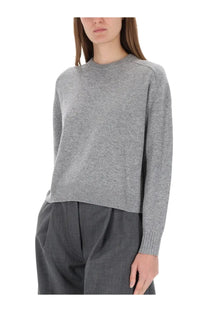 Theory women’s cashmere sweater in soft heather gray with classic crew neck and ribbed cuffs
