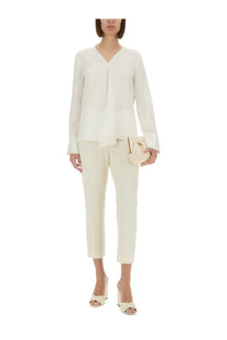 Theory women’s cream silk georgette blouse with long sleeves v neck and layered peplum hem with front pleating