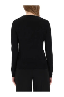 Theory women’s black wool jersey long-sleeved knit top with round neckline shown from the front