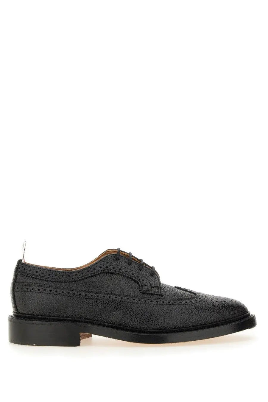 Thom Browne men’s brogue classic longwing black leather oxford shoe with textured surface and perforated detailing